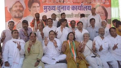 Ghaziabad Congress party west UP president Naseemuddin Siddiqui, Congress party mayoral candidate Pushpa Rawat and other party workers at the party office in Ghaziabad on Wednesday. (Sakib Ali/HT Photo)