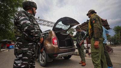 Special operations group and CRPF personnel check vehicles on the Jammu-Pathankot highway amid a high alert, on the outskirts of Jammu, on Wednesday. (PTI) Special operations group and CRPF personnel check vehicles on the Jammu-Pathankot highway amid a high alert, on the outskirts of Jammu, on Wednesday. (PTI)