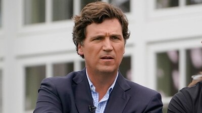 FILE - Tucker Carlson attends the final round of the Bedminster Invitational LIV Golf tournament in Bedminster, N.J., Sunday, July 31, 2022. (AP) FILE - Tucker Carlson attends the final round of the Bedminster Invitational LIV Golf tournament in Bedminster, N.J., Sunday, July 31, 2022. (AP)