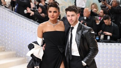 Priyanka and Nick blended in with the crowd in their black outfits, which were anything but basic. (REUTERS) 
