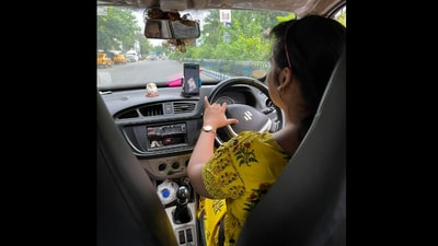 Dipta Ghosh left her job and started driving a cab to support her family. (Facebook/@Param Kalyan Singh) Dipta Ghosh left her job and started driving a cab to support her family. (Facebook/@Param Kalyan Singh)