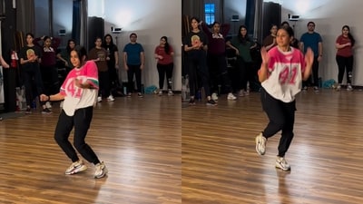 The image, taken from the viral video, shows a woman dancing to the song Jhoom Barabar Jhoom. (Instagram/@sneadesai) The image, taken from the viral video, shows a woman dancing to the song Jhoom Barabar Jhoom. (Instagram/@sneadesai)