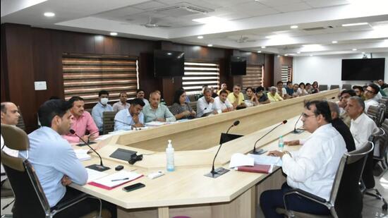 Gurugram, India-May 03, 2023: Nishant Kumar Yadav, Deputy Commissioner held a meeting with developers of Chintels Paradiso and the residents of Towers D, E and F at meeting hall in Mini Secretariat, in Gurugram, India, on Wednesday, 03 May 2023. (Photo /HT)(Pic to go with Leena Dhankar's story)