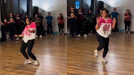 The image, taken from the viral video, shows a woman dancing to the song Jhoom Barabar Jhoom. (Instagram/@sneadesai)
