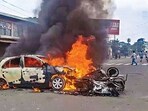 Vehicles in flames after violence broke out during the 'Tribal Solidarity March' called by All Tribal Student Union Manipur (ATSUM), in Imphal on Thursday. (PTI) Vehicles in flames after violence broke out during the 'Tribal Solidarity March' called by All Tribal Student Union Manipur (ATSUM), in Imphal on Thursday. (PTI)