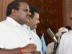 JD(S) leader and former prime minister HD Deve Gowda (right) with his son HD Kumaraswamy (left). (PTI)