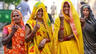 Women show inked finger after they cast their votes. (Deepak Gupta / Hindustan Times) Women show inked finger after they cast their votes. (Deepak Gupta / Hindustan Times)