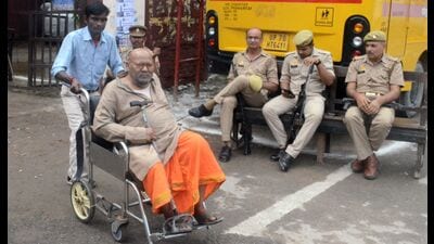 A man in wheelchair arrives at a polling centre to cast vote in Prayagraj on Thursday. (Anil Kumar Maurya/HT)