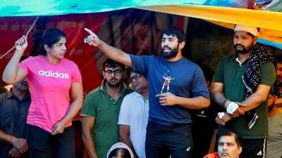 Wrestlers Bajrang Punia and Sakshi Mallik during the protest against WFI chief Brij Bhushan Sharan Singh, at Jantar Mantar in New Delhi on Thursday. (ANI Photo) Wrestlers Bajrang Punia and Sakshi Mallik during the protest against WFI chief Brij Bhushan Sharan Singh, at Jantar Mantar in New Delhi on Thursday. (ANI Photo)