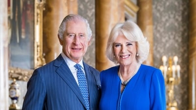 Britain's King Charles III and Camilla pose for a photo in the Blue Drawing Room at Buckingham Palace, London. (AP) Britain's King Charles III and Camilla pose for a photo in the Blue Drawing Room at Buckingham Palace, London. (AP)