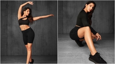 Nora slipped into black workout clothes for the second set of pictures. The star wore a one-shoulder sports bra, a cropped jacket, and biker shorts. She styled the all-black ensemble with matching sneakers, side-parted open wavy locks, earrings, and glowing skin. (Instagram) Nora slipped into black workout clothes for the second set of pictures. The star wore a one-shoulder sports bra, a cropped jacket, and biker shorts. She styled the all-black ensemble with matching sneakers, side-parted open wavy locks, earrings, and glowing skin. (Instagram)