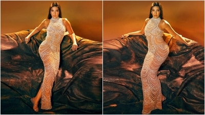 Earlier, Nora Fatehi had shared pictures from a photoshoot featuring the dress she wore to the Filmfare Awards. "To her man, I'm the girl of his dreams. Thinkin' 'bout me when he brushin' his teeth," she captioned the images. The ensemble is from the shelves of designer Yousef Aljasmi's label. The halter-neck ensemble features embellished diamantes in abstract patterns. (Instagram) Earlier, Nora Fatehi had shared pictures from a photoshoot featuring the dress she wore to the Filmfare Awards. "To her man, I'm the girl of his dreams. Thinkin' 'bout me when he brushin' his teeth," she captioned the images. The ensemble is from the shelves of designer Yousef Aljasmi's label. The halter-neck ensemble features embellished diamantes in abstract patterns. (Instagram)