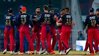 RCB players in action (PTI) RCB players in action (PTI)