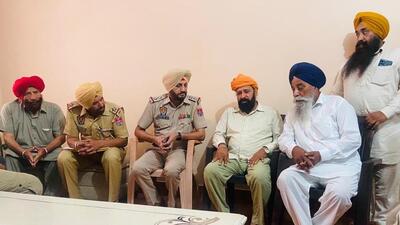 Police personnel at the victims’ house in Bidhipur village of Kapurthala on Thursday. (HT Photo)