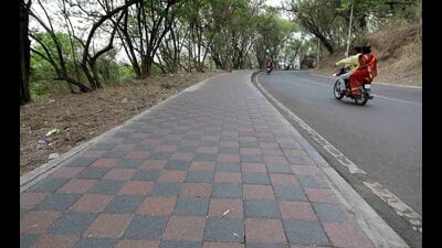 To percolate and drain the rainwater and boost the groundwater level, Pune Municipal Corporation (PMC) has decided to lay pervious blocks on the footpath in Bibvewadi area on a pilot basis. (Rahul Raut/HT PHOTO) To percolate and drain the rainwater and boost the groundwater level, Pune Municipal Corporation (PMC) has decided to lay pervious blocks on the footpath in Bibvewadi area on a pilot basis. (Rahul Raut/HT PHOTO)