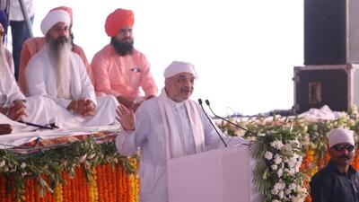 Union home minister Amit Shah addressing a gathering during the prayer meeting (antim ardas) for former chief minister and Akali patriarch Parkash Singh Badal at Badal village in Muktsar district on Thursday. (Sanjeev Kumar/HT) Union home minister Amit Shah addressing a gathering during the prayer meeting (antim ardas) for former chief minister and Akali patriarch Parkash Singh Badal at Badal village in Muktsar district on Thursday. (Sanjeev Kumar/HT)