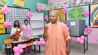 Uttar Pradesh chief minister Yogi Adityanath showing his ink-marked finger after voting in Gorakhpur. (ANI PHOTO) Uttar Pradesh chief minister Yogi Adityanath showing his ink-marked finger after voting in Gorakhpur. (ANI PHOTO)