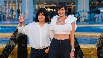 Actor Mandira Bedi made a rare public appearance with her son Vir. They both wore matching black and white outfits for the opening night of NMACC's The Sound Of Music Broadway musical. Actor Mandira Bedi made a rare public appearance with her son Vir. They both wore matching black and white outfits for the opening night of NMACC's The Sound Of Music Broadway musical.