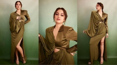 Sonakshi Sinha's upcoming series "Dahaad" is not the only thing making waves - her stunning promotional looks are turning heads too! Recently, at the trailer launch of her web show, Sonakshi was seen sporting a chic olive dress that highlighted her impeccable fashion sense and left her fans drooling. (Instagram/@aslisona) Sonakshi Sinha's upcoming series "Dahaad" is not the only thing making waves - her stunning promotional looks are turning heads too! Recently, at the trailer launch of her web show, Sonakshi was seen sporting a chic olive dress that highlighted her impeccable fashion sense and left her fans drooling. (Instagram/@aslisona)