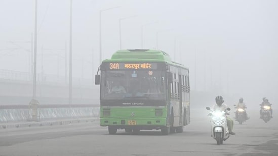 Commuters out on a foggy morning at Kalindi Kunj as Delhi-NCR saw unusual fog for a May morning on Thursday after three days of rain and overcast skies. (Sunil Ghosh/HT Photo)