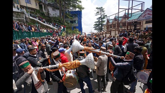 Congress supporters celebrate as the party wins the Shimla Municipal Corporation elections on Thursday. (ANI)