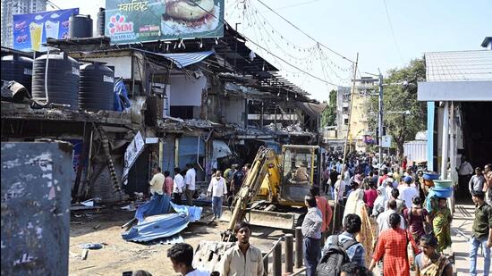 Mumbai, Apr 28 (ANI): The outlets of 'MM Mithaiwala' and 'Delhi Sweets' sweet shops being razed by Brihanmumbai Municipal Corporation (BMC) alongside Anand Road along with 19 other shops outside Malad Station (West) in order to widen the road, in Mumbai on Friday. (ANI Photo) (Vijay Shankar Bate)