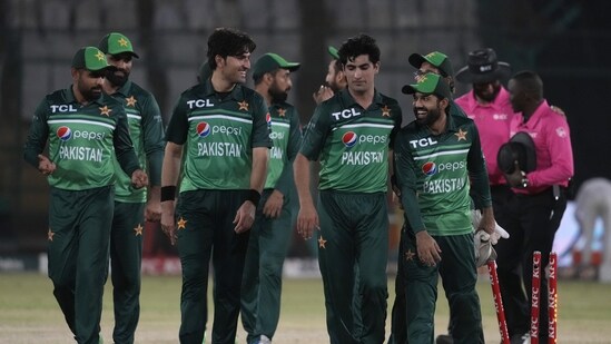 Pakistan's Babar Azam, left, and teammates celebrate after winning the third one-day international cricket match between Pakistan and New Zealand, in Karachi, Pakistan, Wednesday, May 3, 2023. (AP Photo/Fareed Khan) (AP)