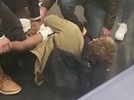 Video grab handout image obtained May 4, 2023 and shot by a witness on Monday, May 1, 2023, shows the moment a homeless man, identified by the police as Jordan Neely, was put in a chokehold by a fellow rider on the New York C subway. Video grab handout image obtained May 4, 2023 and shot by a witness on Monday, May 1, 2023, shows the moment a homeless man, identified by the police as Jordan Neely, was put in a chokehold by a fellow rider on the New York C subway.