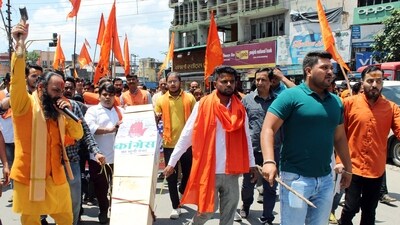 Bajrang Dal members stage a protest against Congress's manifesto for Karnataka Assembly elections on Thursday. (ANI Photo) (Princess Ilvita) Bajrang Dal members stage a protest against Congress's manifesto for Karnataka Assembly elections on Thursday. (ANI Photo) (Princess Ilvita)