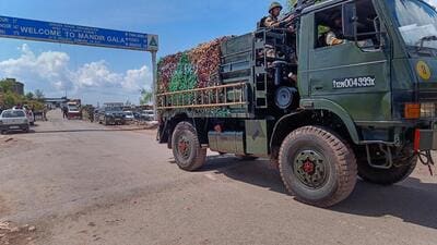 An army vehicle on its way to the site of the ambush. (PTI) An army vehicle on its way to the site of the ambush. (PTI)