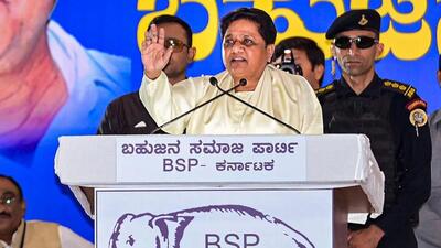 BSP chief Mayawati addressing a public rally in Bengaluru on Friday. (PTI PHOTO) BSP chief Mayawati addressing a public rally in Bengaluru on Friday. (PTI PHOTO)