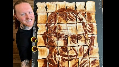 King Charles portrait using made using Marmite to celebrate his coronation. (Twitter/@Nathanwyburn)