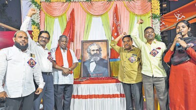 Mumbai, India - May 05, 2023: 205th birth anniversary of world-renowned German philosopher, political theorist and socialist revolutionary Karl Marx was celebrated by PWP activists, organised by local PWP youth activist Samya Korde, at Dharavi, in Mumbai, India, on Friday, May 05, 2023. (Photo by) (Vijay Bate/HT Photo) Mumbai, India - May 05, 2023: 205th birth anniversary of world-renowned German philosopher, political theorist and socialist revolutionary Karl Marx was celebrated by PWP activists, organised by local PWP youth activist Samya Korde, at Dharavi, in Mumbai, India, on Friday, May 05, 2023. (Photo by) (Vijay Bate/HT Photo)