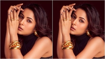 If you're looking for versatile and easy-to-do nail art that can be worn on any occasion, then metallic nail art is the way to go. Take inspiration from Shehnaaz Gill and choose a dark metallic shade for your nails and paint them to perfection. Add some golden accessories to your look to achieve a glamorous and stylish appearance. (Instagram) If you're looking for versatile and easy-to-do nail art that can be worn on any occasion, then metallic nail art is the way to go. Take inspiration from Shehnaaz Gill and choose a dark metallic shade for your nails and paint them to perfection. Add some golden accessories to your look to achieve a glamorous and stylish appearance. (Instagram)
