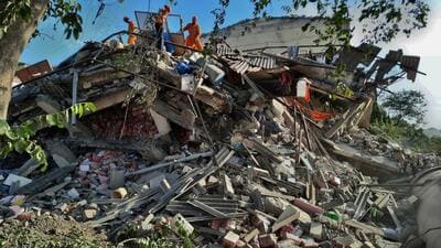 Thane, India - April 29, 2023: Rescue operation underway as residents are trapped after a three-storeyed building collapsed in Vardhaman Complex, at Bhiwandi, in Thane, in Mumbai, India, on Saturday, April 29, 2023. (Praful Gangurde/HT Photo) (HT PHOTO) Thane, India - April 29, 2023: Rescue operation underway as residents are trapped after a three-storeyed building collapsed in Vardhaman Complex, at Bhiwandi, in Thane, in Mumbai, India, on Saturday, April 29, 2023. (Praful Gangurde/HT Photo) (HT PHOTO)