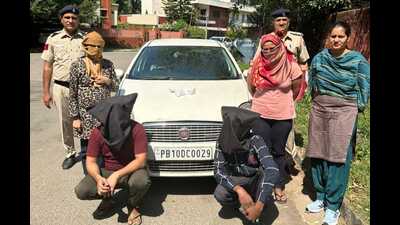 The accused in the custody of the Chandigarh Police on Friday. (HT Photo)