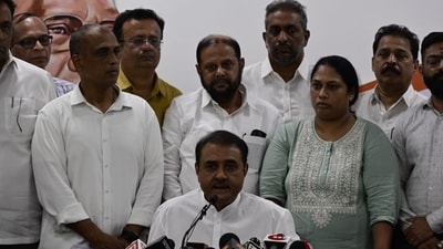NCP leader Praful Patel announcing the core committee's decision to reject Sharad Pawar's resignation, requesting him to respect sentiments of all. (Anshuman Poyrekar/ Hindustan Times) NCP leader Praful Patel announcing the core committee's decision to reject Sharad Pawar's resignation, requesting him to respect sentiments of all. (Anshuman Poyrekar/ Hindustan Times)