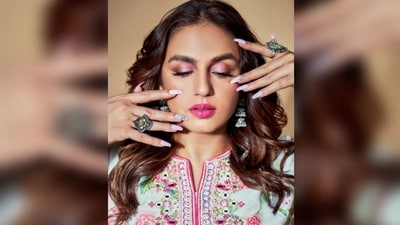 The trendiest nail art of the season is adding glitter to your nails, and Huma Qureshi shows us how to do it right. Start by painting your nails with a pastel colour, then add glitter to the nails of your middle finger and some crystals to the others for a touch of elegance. Follow Huma's lead to slay any occasion with your stunning nails. (Instagram/@Iamhumaq) The trendiest nail art of the season is adding glitter to your nails, and Huma Qureshi shows us how to do it right. Start by painting your nails with a pastel colour, then add glitter to the nails of your middle finger and some crystals to the others for a touch of elegance. Follow Huma's lead to slay any occasion with your stunning nails. (Instagram/@Iamhumaq)