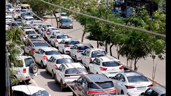 A traffic jam at Ishmeet Chowk in Model Town area of Ludhiana on Friday. (Manish/HT)