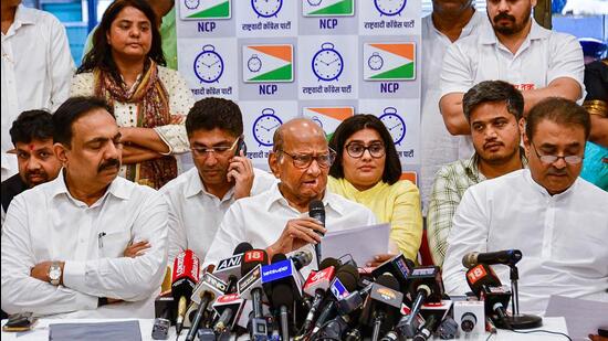 Nationalist Congress Party chief Sharad Pawar with party leaders addresses the media at the YB Chavan Center, in Mumbai. (PTI)