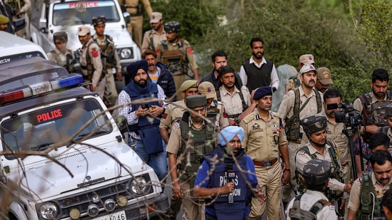 Security personnel at the site of the encounter in Rajouri district on Friday. (PTI)