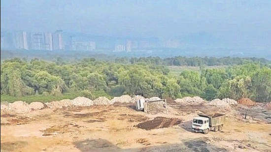 Thane, India - April 26, 2023: Construction debris dumped on forest land has destroyed more than 500 mangrove trees, at Kasheli, near Dutt Mandir, Bhiwandi, in Thane, India, on Wednesday, April 26, 2023. (Praful Gangurde/HT Photo) (HT PHOTO)