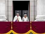 Britain's King Charles III and Queen Camilla greet the crowds from the balcony of Buckingham Palace after the coronation ceremony in London, Saturday, May 6, 2023. (AP Photo/Frank Augstein)