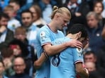 Manchester City's Erling Braut Haaland gives the ball to Ilkay Gundogan to take a penalty