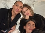 Kardashian sisters unveil unfiltered look in rare snapshot together.