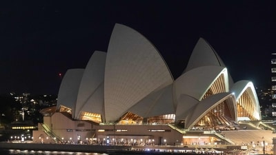 This picture shows the Sydney Opera House with its lights switched off. (AFP) This picture shows the Sydney Opera House with its lights switched off. (AFP)