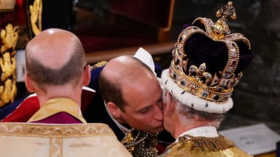 Prince William kisses his father King Charles III during his coronation ceremony at Westminster Abbey in London, Saturday May 6, 2023. (AP) Prince William kisses his father King Charles III during his coronation ceremony at Westminster Abbey in London, Saturday May 6, 2023. (AP)