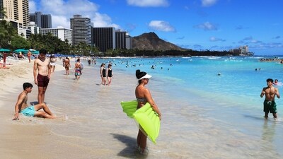 Beach goers take to the waves on Waikiki Beach in Honolulu, Hawaii. Hawaii’s over-tourism problem may get worse than ever. Here's why (AP Photo/Marco Garcia) Beach goers take to the waves on Waikiki Beach in Honolulu, Hawaii. Hawaii’s over-tourism problem may get worse than ever. Here's why (AP Photo/Marco Garcia)
