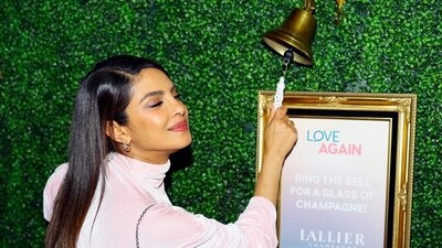 The Instagram account of Priyanka Chopra's restaurant, Sona, shared a picture of the actor ringing a bell. She closed her eyes, smiled and pulled the bell. 