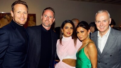 Priyanka Chopra also posed with her Love Again co-star Sam Heughan and their friends in one of the photos. 